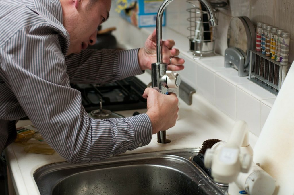 plumber-228010_1920 plumbing assisting resident with water leak