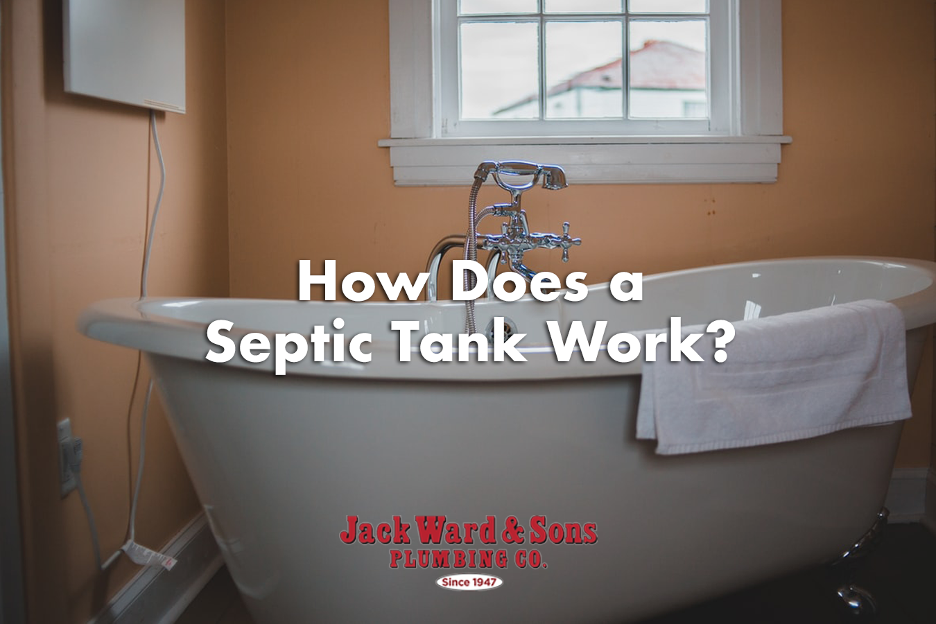 white bathtub in peach painted bathroom with text reading "how does a septic tank work?" in white letters
